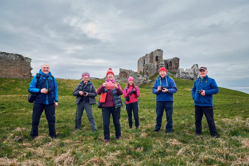 Moray Mountaineering Club members beside Duffus Castle