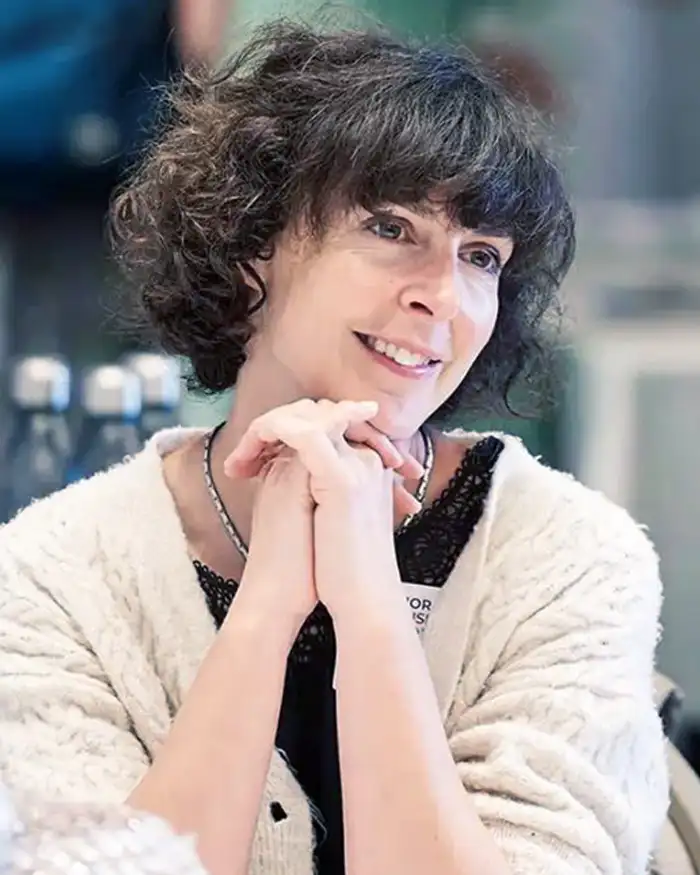 woman looking attentive at event